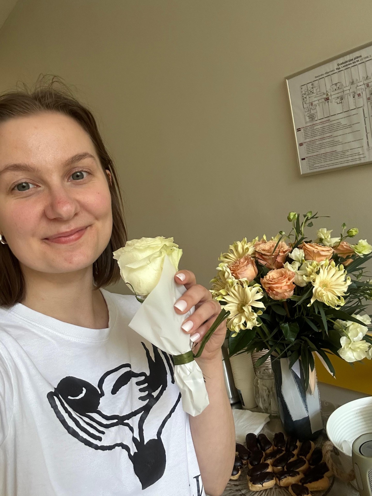Dana with flowers at the hospice